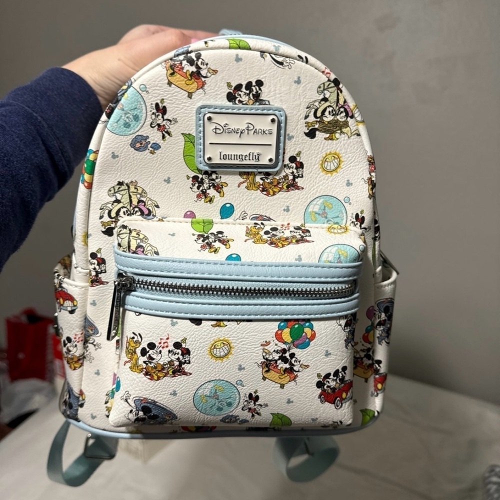 Loungefly runaway railway backpack